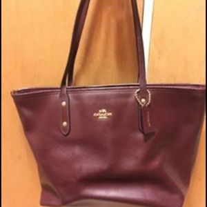 Dark purple coach purse